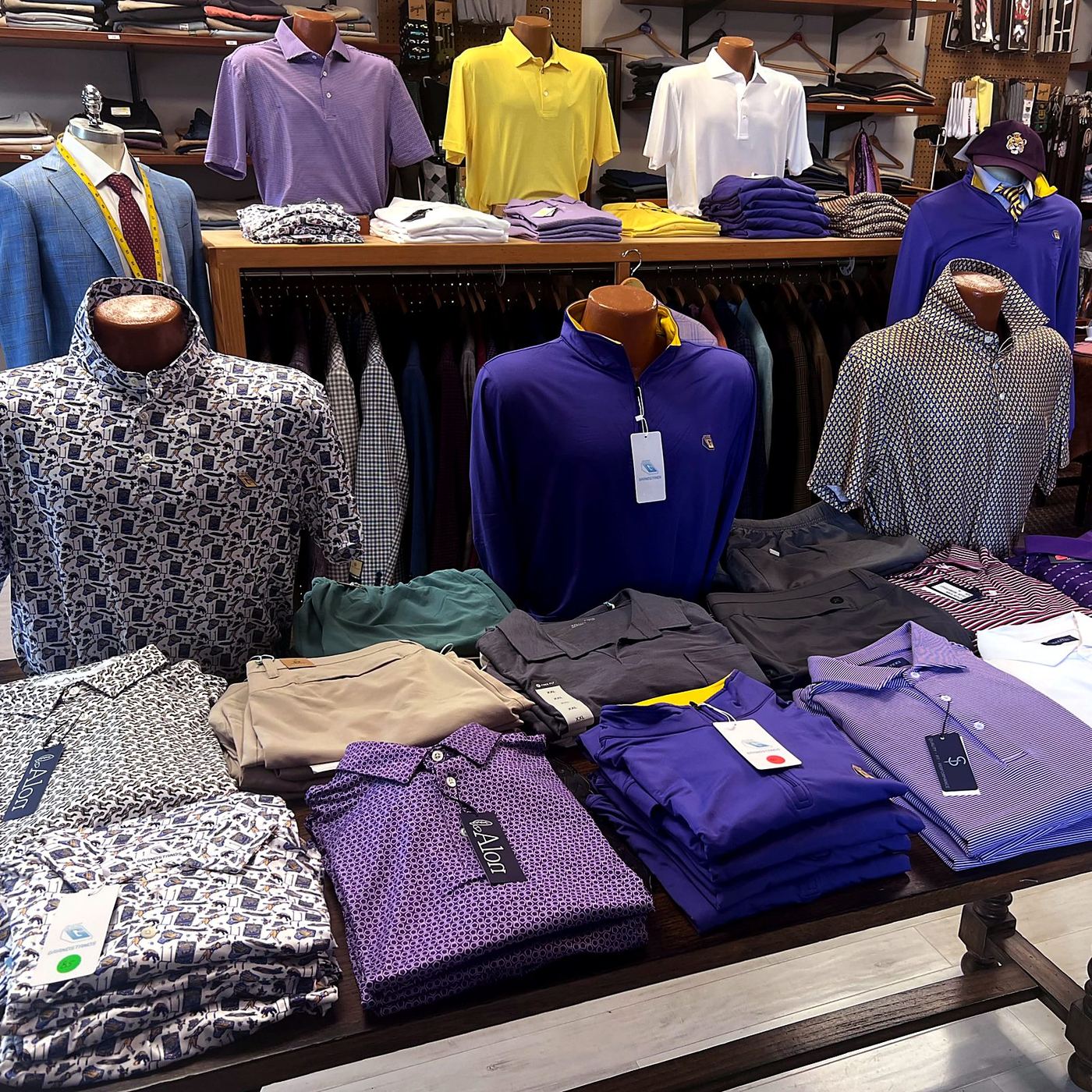 The sales floor at Harper's, polos and sport shirts on tables and shelves