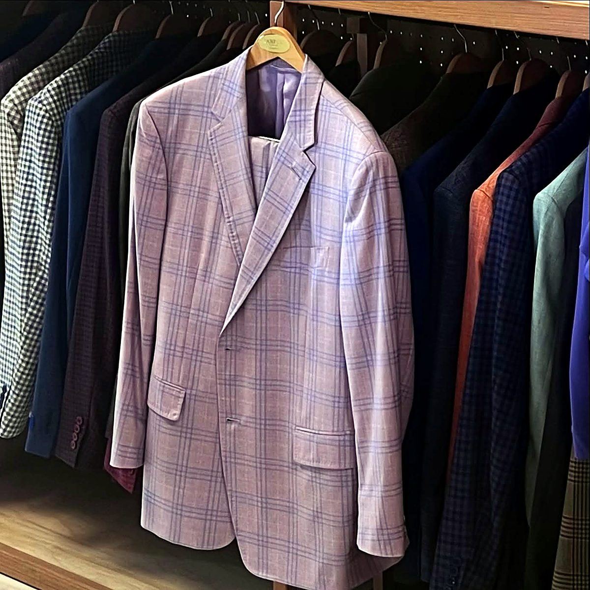 A lavender plaid sport coat on the rack